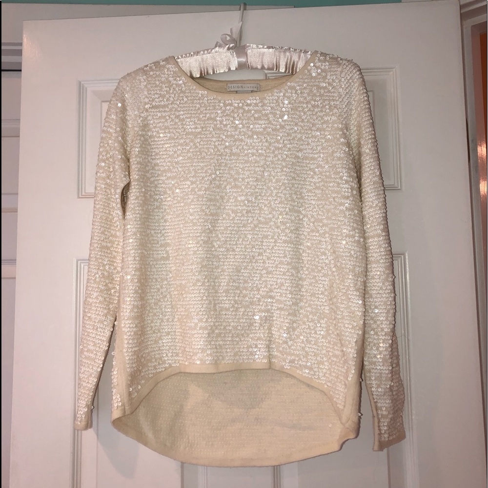 Creamy white sequin long sleeve top.